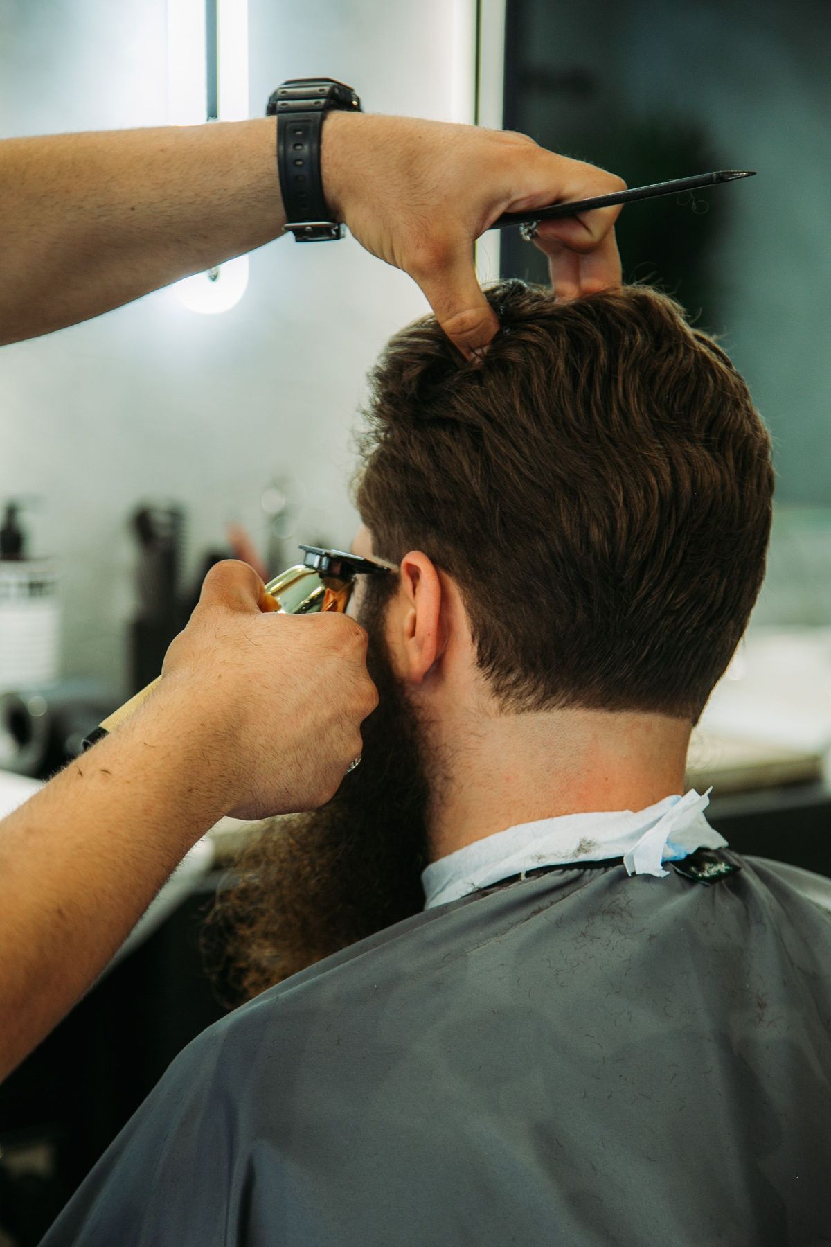 Client getting a haircut at SNIP LONDON